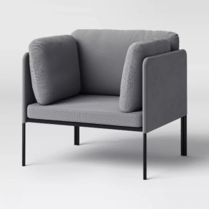 DESCRIPCION IA Silla , gris. Diseño moderno y compacto en tela de poliéster. Patas de madera robustas. Ideal para espacios reducidos aportando un estilo minimalista y confort