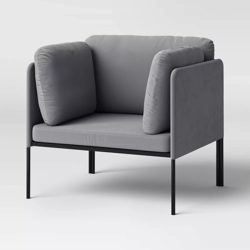 DESCRIPCION IA Silla , gris. Diseño moderno y compacto en tela de poliéster. Patas de madera robustas. Ideal para espacios reducidos aportando un estilo minimalista y confort